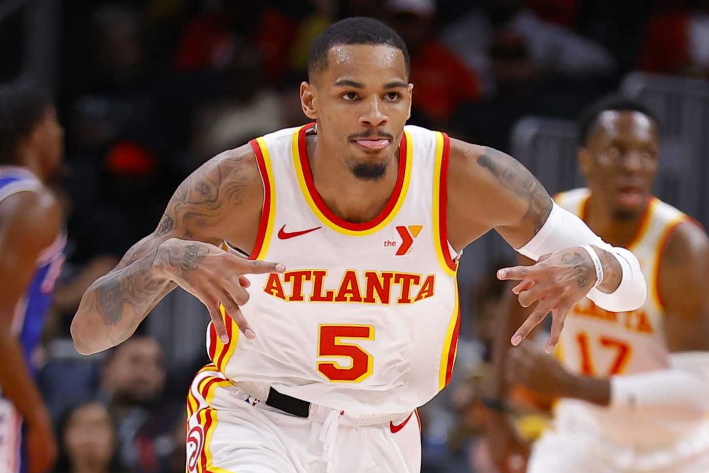 ATLANTA, GEORGIA - JANUARY 10: Dejounte Murray #5 of the Atlanta Hawks reacts during the second quarter against the Philadelphia 76ers at State Farm Arena on January 10, 2024 in Atlanta, Georgia. NOTE TO USER: User expressly acknowledges and agrees that, by downloading and or using this photograph, User is consenting to the terms and conditions of the Getty Images License Agreement. (Photo by Todd Kirkland/Getty Images)