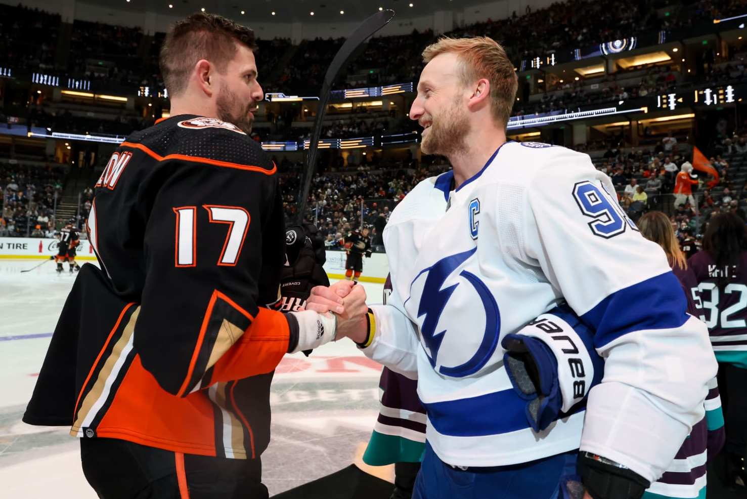 ANAHEIM, CA - MARCH 24: Alex Killorn #17 of the Anaheim Ducks and Steven Stamkos #91 of the Tampa Bay Lightning shake hands during the ceremonial puck drop prior to the game between the Tampa Bay Lightning and the Anaheim Ducks at Honda Center on March 24, 2024 in Anaheim, California. (Photo by Debora Robinson/NHLI via Getty Images)