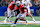 ARLINGTON, TX - JANUARY 10: Ohio State Buckeyes running back Quinshon Judkins (#1) runs up field during the CFP Semifinal Cotton Bowl Classic football game between the Ohio State Buckeyes and Texas Longhorns on January 10, 2025 at AT&T Stadium in Arlington, TX. (Photo by Matthew Visinsky/Icon Sportswire via Getty Images)
