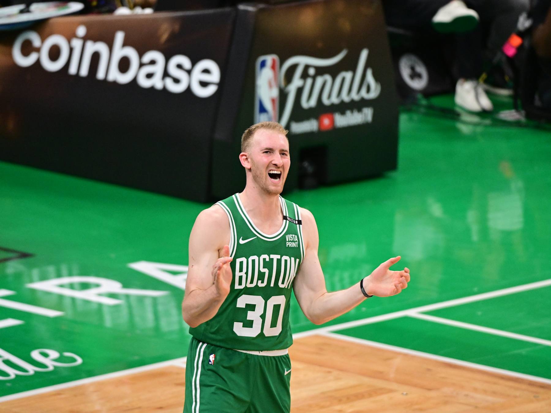 BOSTON, MA - JUNE 17: Sam Hauser #30 of the Boston Celtics celebrates during the game against the Dallas Mavericks during Game Five of the 2024 NBA Finals on June 17, 2024 at the TD Garden in Boston, Massachusetts. NOTE TO USER: User expressly acknowledges and agrees that, by downloading and or using this photograph, User is consenting to the terms and conditions of the Getty Images License Agreement. Mandatory Copyright Notice: Copyright 2024 NBAE  (Photo by Adam Hagy/NBAE via Getty Images)