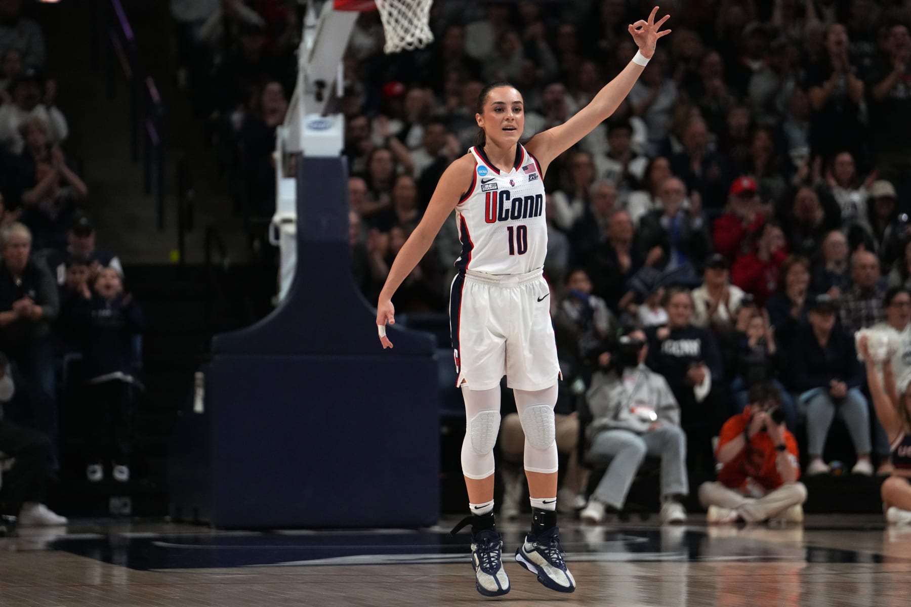STORRS, CONNECTICUT - MARCH 25: Nika Muhl #10 of the Connecticut Huskies reacts while playing the Syracuse Orange during the first half of a second round NCAA Women's Basketball Tournament game at the Harry A. Gampel Pavilion on March 25, 2024 in Storrs, Connecticut. (Photo by Joe Buglewicz/Getty Images)