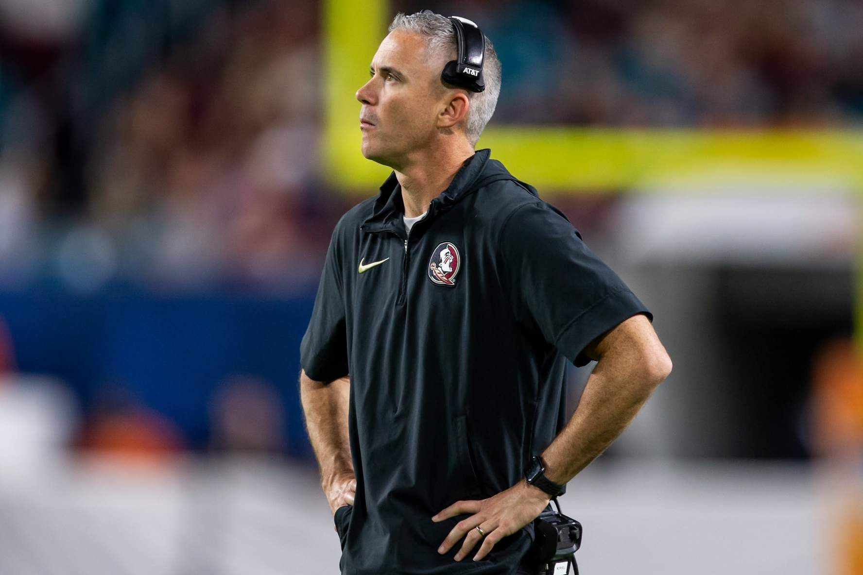 MIAMI GARDENS, FL - DECEMBER 30: Florida State head coach Mike Norvell watches the view board after a Georgia touchdown during the 90th Capital One Orange Bowl Game between the Florida State Seminoles and the Georgia Bulldogs on Saturday, December 30, 2023 at Hard Rock Stadium in Miami Gardens, FL.  (Photo by Nick Tre. Smith/Icon Sportswire via Getty Images)