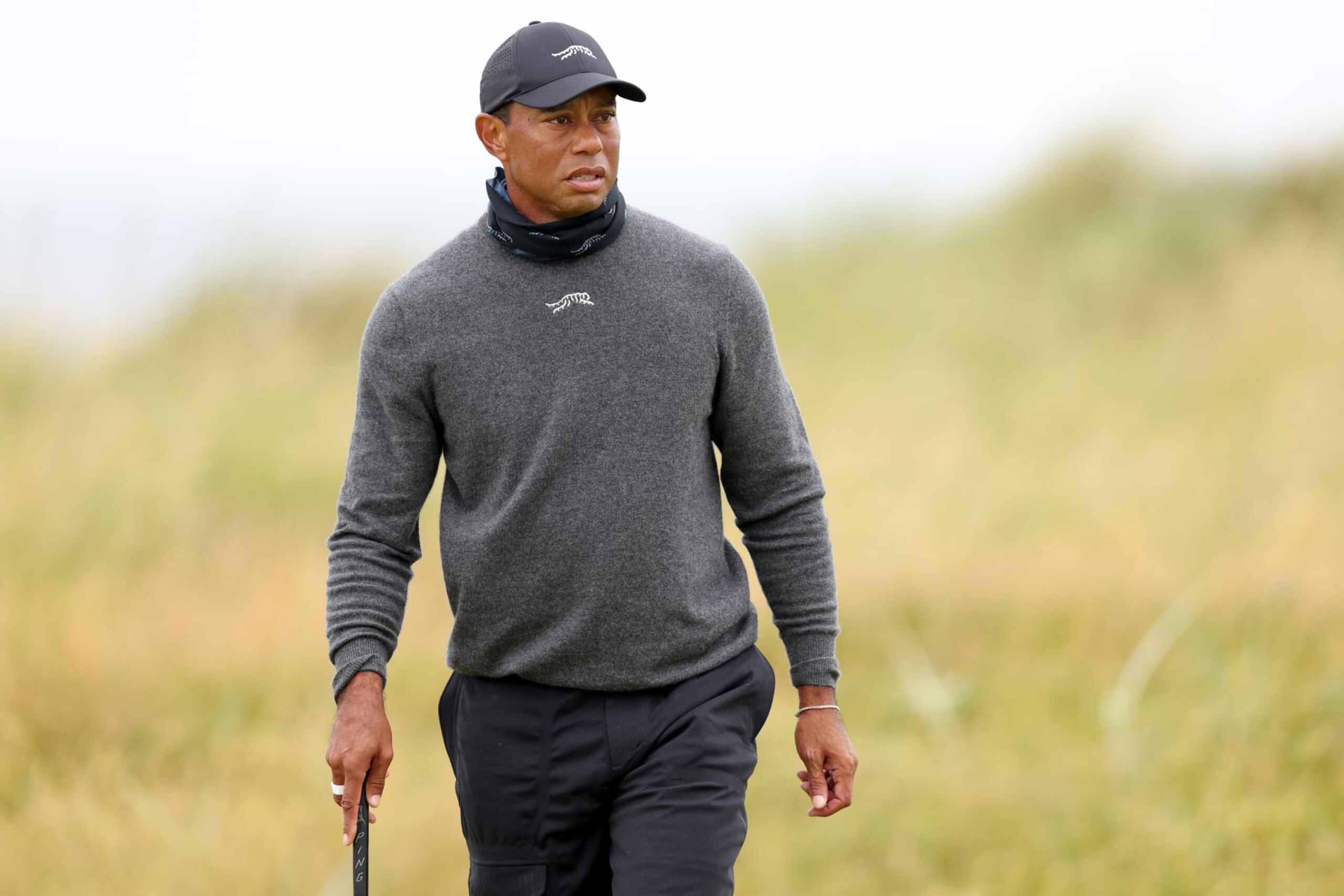 TROON, SCOTLAND - JULY 18: Tiger Woods of the United States looks on on day one of The 152nd Open championship at Royal Troon on July 18, 2024 in Troon, Scotland. (Photo by Kevin C. Cox/Getty Images)