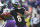 BALTIMORE, MARYLAND - DECEMBER 31: Lamar Jackson #8 of the Baltimore Ravens throws a pass against the Miami Dolphins during the first quarter of the game at M&T Bank Stadium on December 31, 2023 in Baltimore, Maryland. (Photo by Rob Carr/Getty Images)