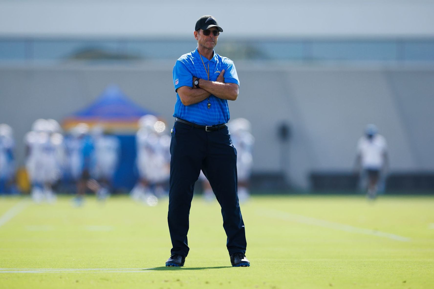 EL SEGUNDO, CALIFORNIA - AUGUST 7: Jim Harbaugh of the Los Angeles Chargers on the field during training camp at The Bolt on August 7, 2024 in El Segundo, California.  (Photo by Ric Tapia/Getty Images)