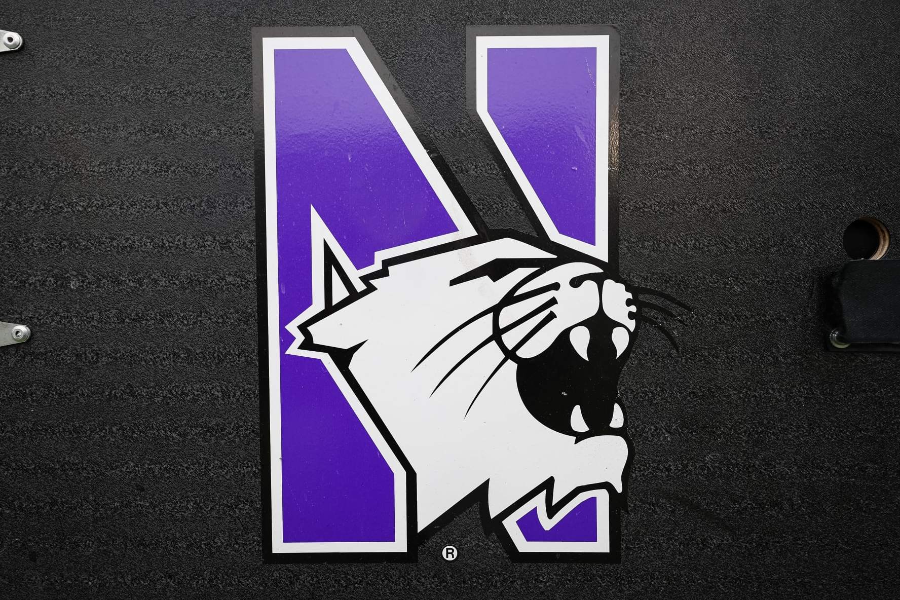 STATE COLLEGE, PA - OCTOBER 01: A general view of the Northwestern Wildcats logo on the sideline before the game between the Penn State Nittany Lions and the Northwestern Wildcats at Beaver Stadium on October 1, 2022 in State College, Pennsylvania. (Photo by Scott Taetsch/Getty Images)