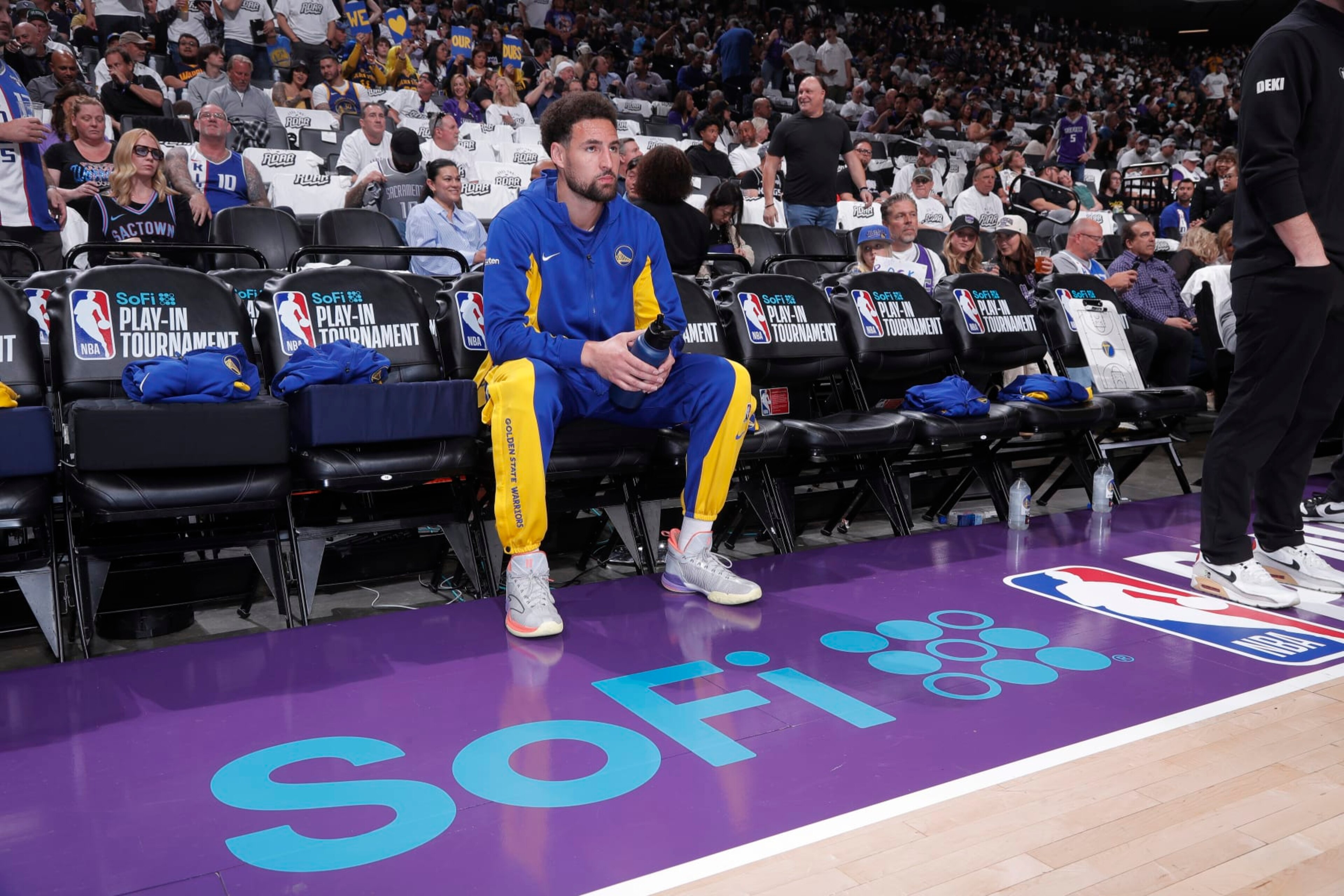 SACRAMENTO, CA - APRIL 16: Klay Thompson #11 of the Golden State Warriors looks on from the bench prior to the game against the Sacramento Kings during the 2024 Play-In Tournament on April 16, 2024 at Golden 1 Center in Sacramento, California. NOTE TO USER: User expressly acknowledges and agrees that, by downloading and or using this photograph, User is consenting to the terms and conditions of the Getty Images Agreement. Mandatory Copyright Notice: Copyright 2024 NBAE (Photo by Rocky Widner/NBAE via Getty Images) SACRAMENTO, CA - APRIL 16: Klay Thompson #11 of the Golden State Warriors looks on from the bench prior to the game against the Sacramento Kings during the 2024 Play-In Tournament on April 16, 2024 at Golden 1 Center in Sacramento, California. NOTE TO USER: User expressly acknowledges and agrees that, by downloading and or using this photograph, User is consenting to the terms and conditions of the Getty Images Agreement. Mandatory Copyright Notice: Copyright 2024 NBAE (Photo by Rocky Widner/NBAE via Getty Images)