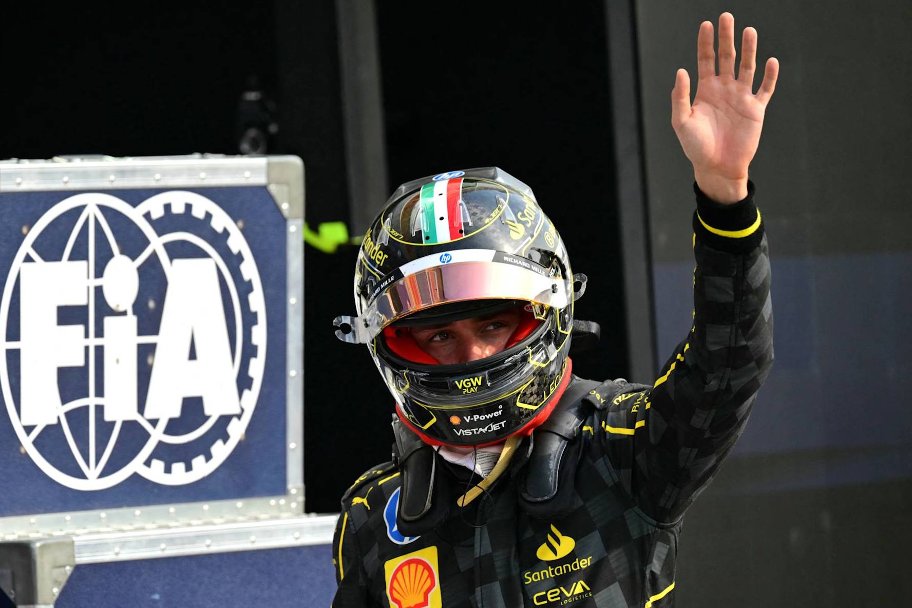 Ferrari's Monegasque driver Charles Leclerc waves a hand after the qualifying session, ahead of the Italian Formula One Grand Prix at Autodromo Nazionale Monza circuit, in Monza on August 31, 2024. (Photo by Andrej ISAKOVIC / AFP) (Photo by ANDREJ ISAKOVIC/AFP via Getty Images)