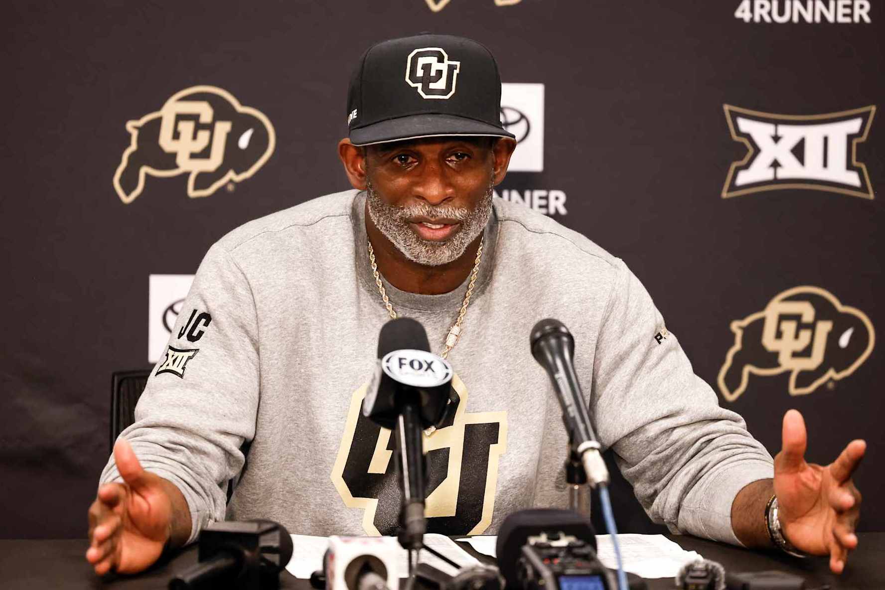 ORLANDO, FL - SEPTEMBER 28: Head Coach Deion Sanders #2 of the Colorado Buffaloes talk with the media during a press conference following the game against the UCF Knights at FBC Mortgage Stadium on September 28, 2024 in Orlando, Florida. The Buffaloes defeated the Knights 48-21. (Photo by Don Juan Moore/Getty Images)
