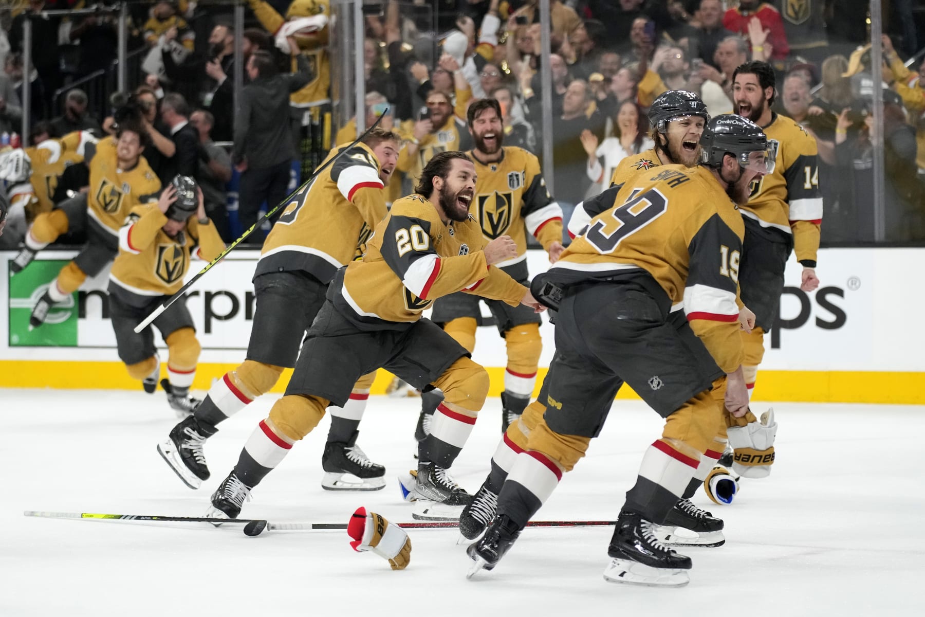 Members of the Vegas Golden Knights celebrate after they defeated the Florida Panthers 9-3 to win the Stanley Cup in Game 5 of the NHL hockey Stanley Cup Finals Tuesday, June 13, 2023, in Las Vegas. (AP Photo/John Locher)