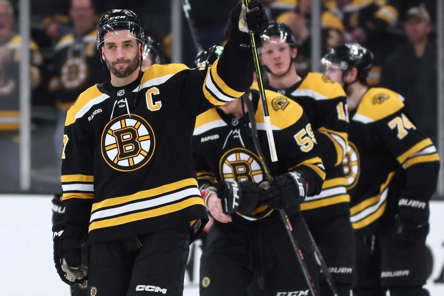 BOSTON, MASSACHUSETTS - APRIL 30: Patrice Bergeron #37 of the Boston Bruins waves to fans before exiting the ice after Florida Panthers defeat the Bruins 4-3 in overtime of Game Seven of the First Round of the 2023 Stanley Cup Playoffs at TD Garden on April 30, 2023 in Boston, Massachusetts. (Photo by Maddie Meyer/Getty Images)