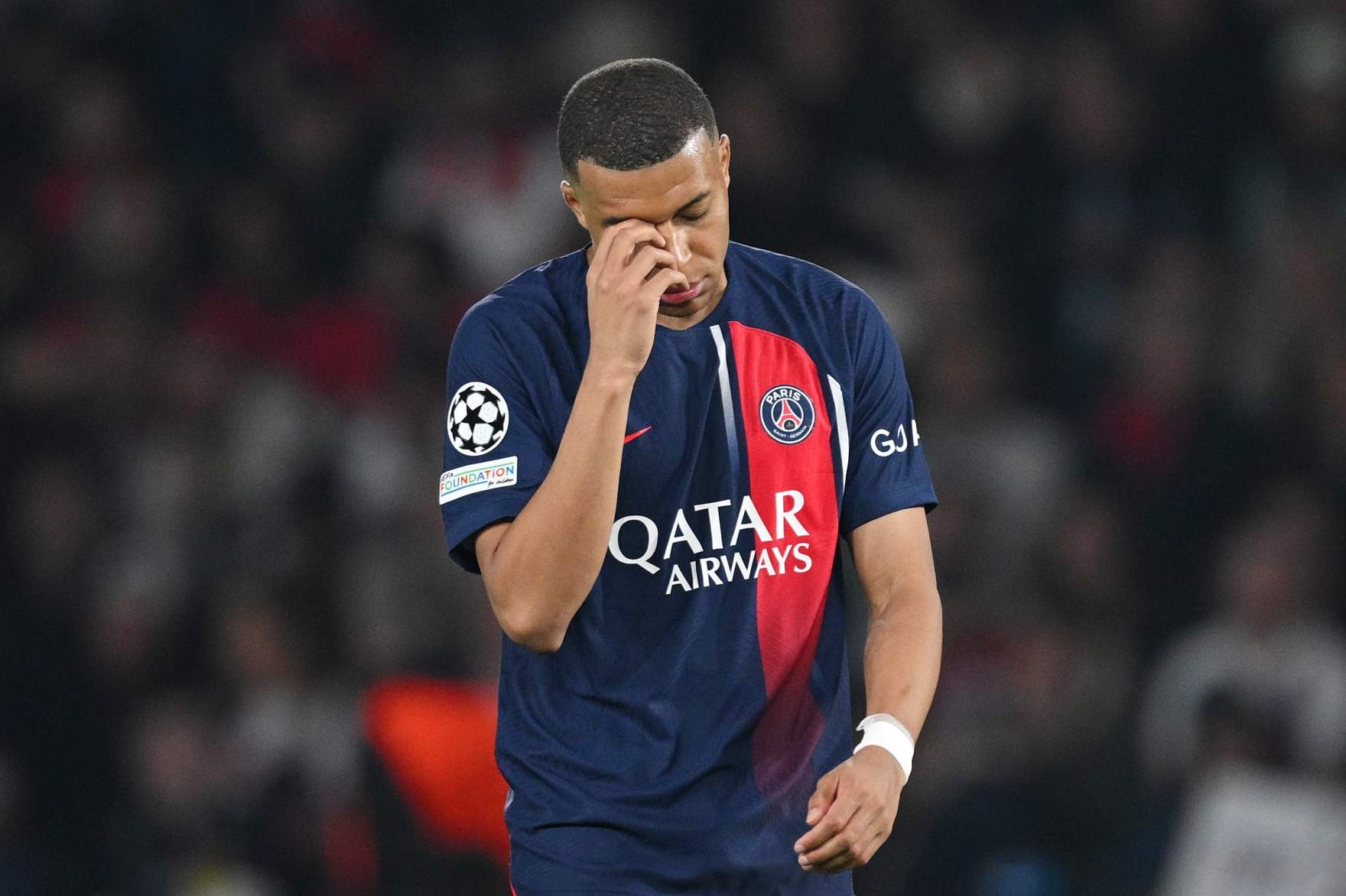 PARIS, FRANCE - MAY 07: Kylian Mbappe of Paris Saint-Germain looks dejected during the UEFA Champions League semi-final second leg match between Paris Saint-Germain and Borussia Dortmund at Parc des Princes on May 07, 2024 in Paris, France. (Photo by Matthias Hangst/Getty Images)