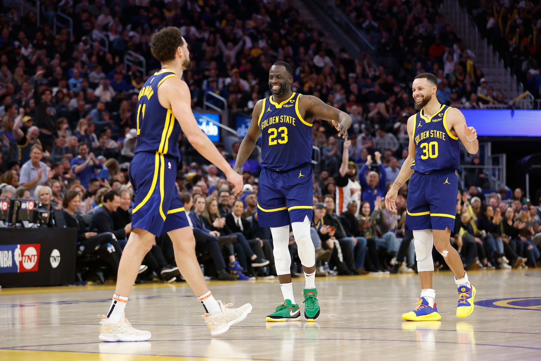 SAN FRANCISCO, CALIFORNIA - FEBRUARY 22: Klay Thompson #11, Draymond Green #23 and Stephen Curry #30 of the Golden State Warriors react after a play in the second half against the Los Angeles Lakers at Chase Center on February 22, 2024 in San Francisco, California. NOTE TO USER: User expressly acknowledges and agrees that, by downloading and or using this photograph, User is consenting to the terms and conditions of the Getty Images License Agreement. (Photo by Lachlan Cunningham/Getty Images)