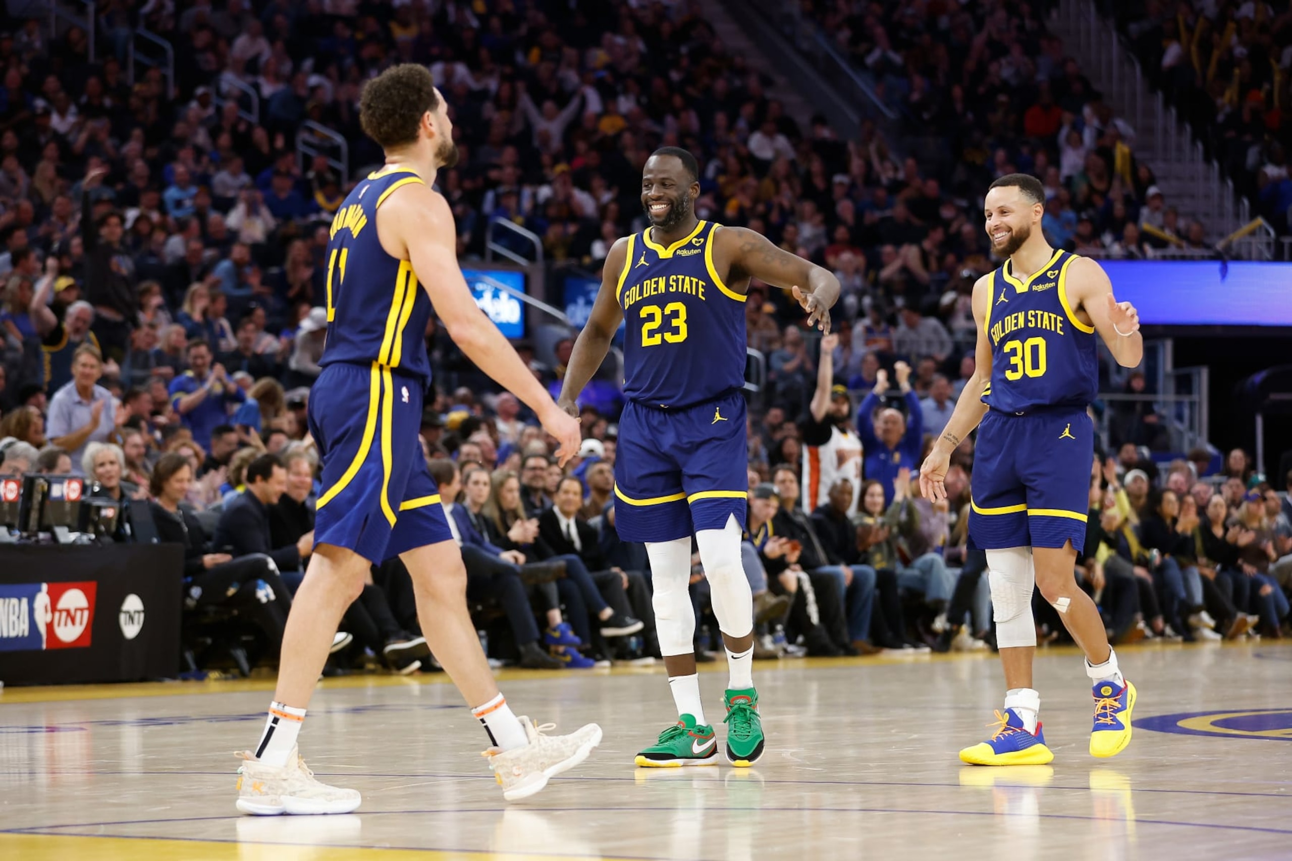 SAN FRANCISCO, CALIFORNIA - FEBRUARY 22: Klay Thompson #11, Draymond Green #23 and Stephen Curry #30 of the Golden State Warriors react after a play in the second half against the Los Angeles Lakers at Chase Center on February 22, 2024 in San Francisco, California. NOTE TO USER: User expressly acknowledges and agrees that, by downloading and or using this photograph, User is consenting to the terms and conditions of the Getty Images License Agreement. (Photo by Lachlan Cunningham/Getty Images)