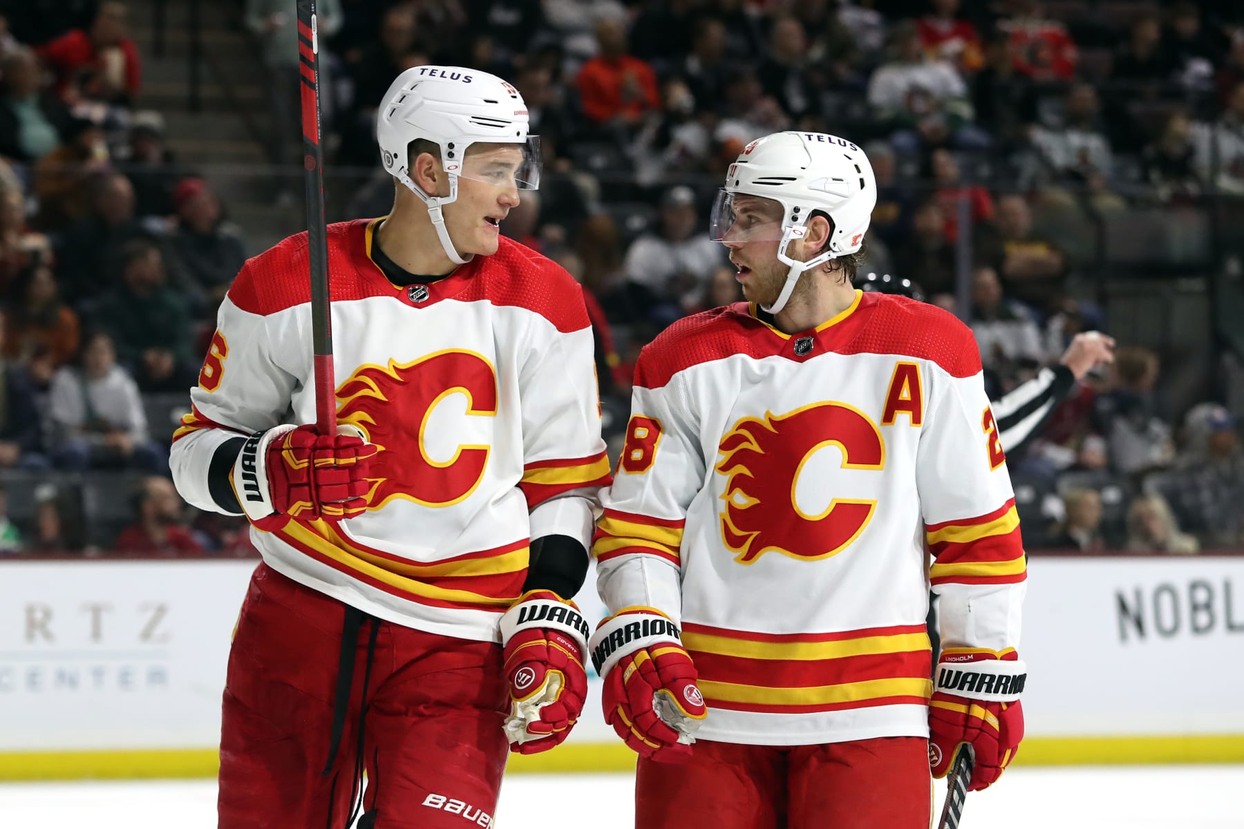 TEMPE, ARIZONA - FEBRUARY 22: Nikita Zadorov #16 of the Calgary Flames and Elias Lindholm #28 of the Calgary Flames sooner than a faceoff against the Arizona Coyotes at Mullett Enviornment on February 22, 2023 in Tempe, Arizona. (Photograph by Zac BonDurant/Getty Pictures)