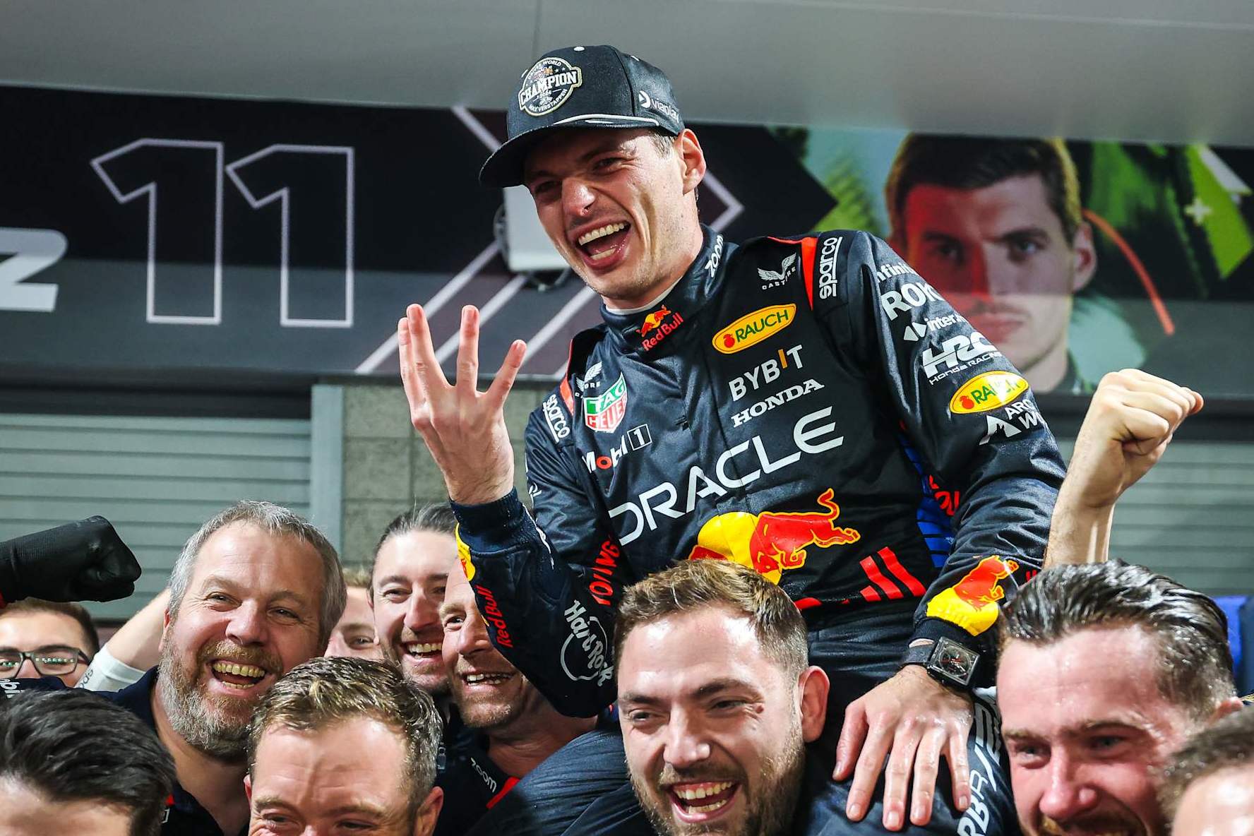 LAS VEGAS, NEVADA - NOVEMBER 23: Max Verstappen of Netherlands and Oracle Red Bull Racing celebrates his fourth World Drivers' Championship with his crew in pit lane during the F1 Grand Prix of Las Vegas at Las Vegas Strip Circuit on November 23, 2024 in Las Vegas, Nevada. (Photo by Kym Illman/Getty Images)