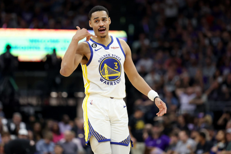 SACRAMENTO, CALIFORNIA - APRIL 26: Jordan Poole #3 of the Golden State Warriors motions back to his bench after making a shot and being fouled by the Sacramento Kings in the first half of Game Five of the Western Conference First Round Playoffs at Golden 1 Center on April 26, 2023 in Sacramento, California. NOTE TO USER: User expressly acknowledges and agrees that, by downloading and or using this photograph, User is consenting to the terms and conditions of the Getty Images License Agreement. (Photo by Ezra Shaw/Getty Images)