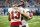 DETROIT, MICHIGAN - JANUARY 21: Baker Mayfield #6 of the Tampa Bay Buccaneers embraces Mike Evans #13 of the Tampa Bay Buccaneers after throwing an interception against the Detroit Lions during the fourth quarter of the NFC Divisional Playoff game at Ford Field on January 21, 2024 in Detroit, Michigan. (Photo by Nic Antaya/Getty Images)