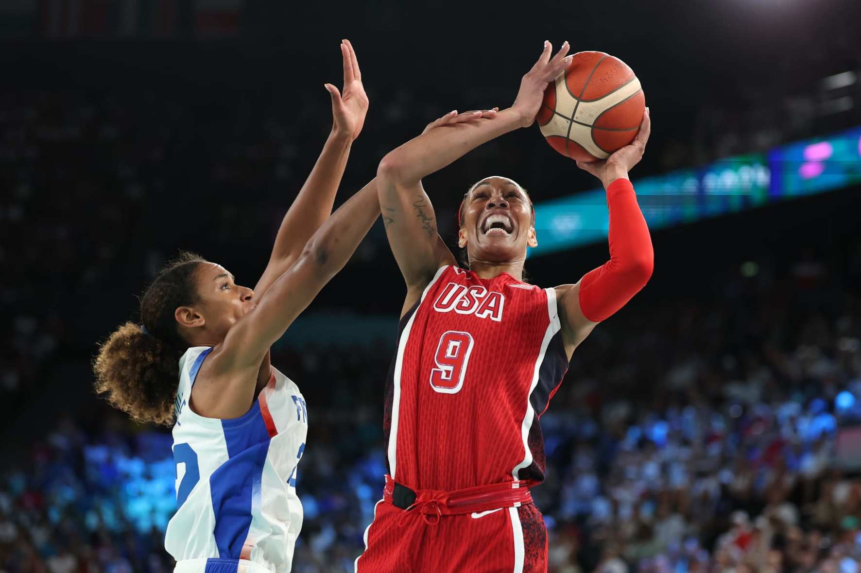 PARIS, FRANCE - AUGUST 11: A'Ja Wilson #9 of Team United States shoots over Marieme Badiane #22 of Team France during the Women's Gold Medal game between Team France and Team United States on day sixteen of the Olympic Games Paris 2024 at Bercy Arena on August 11, 2024 in Paris, France. (Photo by Gregory Shamus/Getty Images)