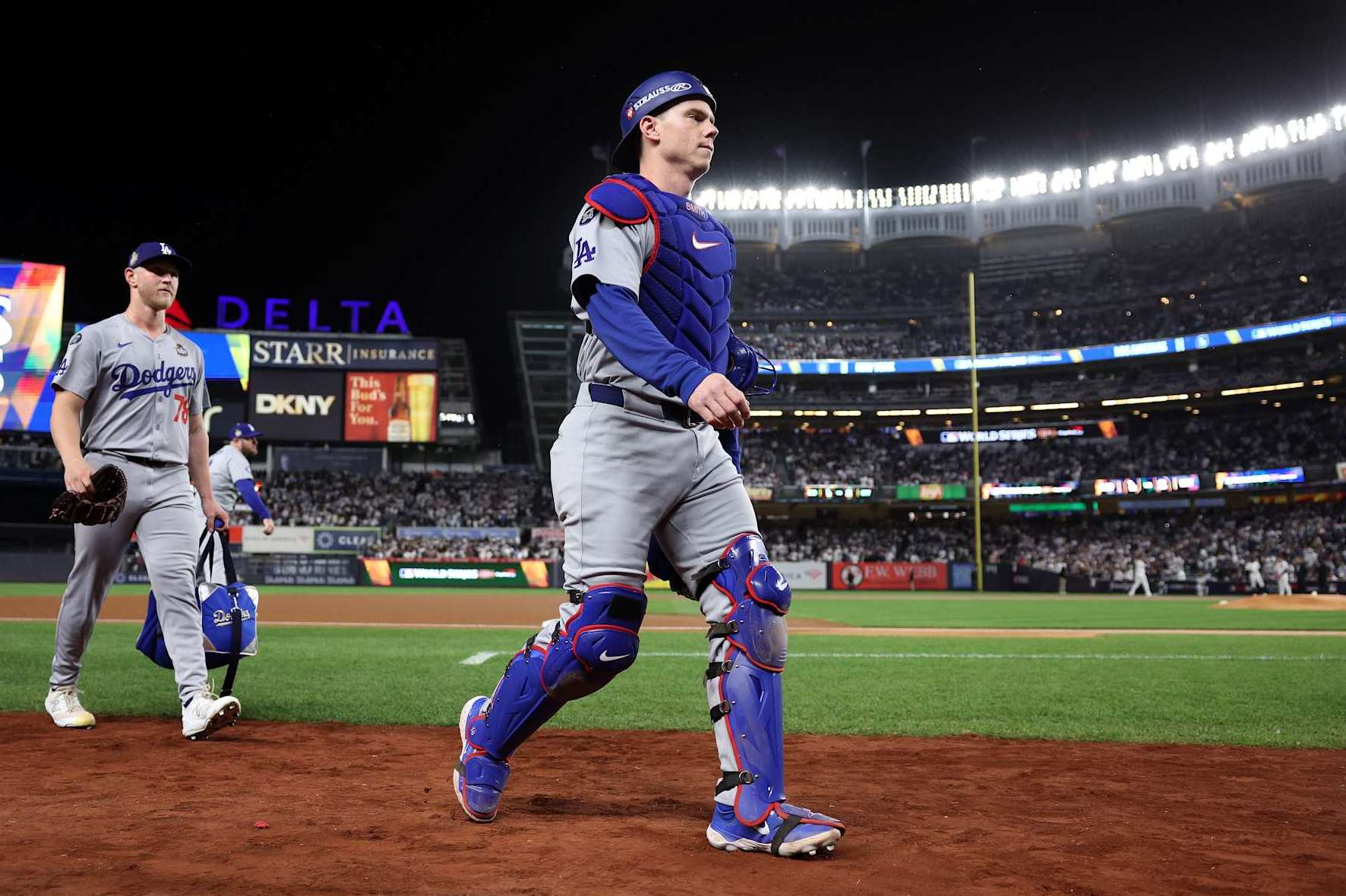 NEW YORK, NEW YORK - OCTOBER 29:  Will Smith #16 of the Los Angeles Dodgers walks to the dugout prior to Game Four of the 2024 World Series against the New York Yankees at Yankee Stadium on October 29, 2024 in the Bronx borough of New York City. (Photo by Elsa/Getty Images)
