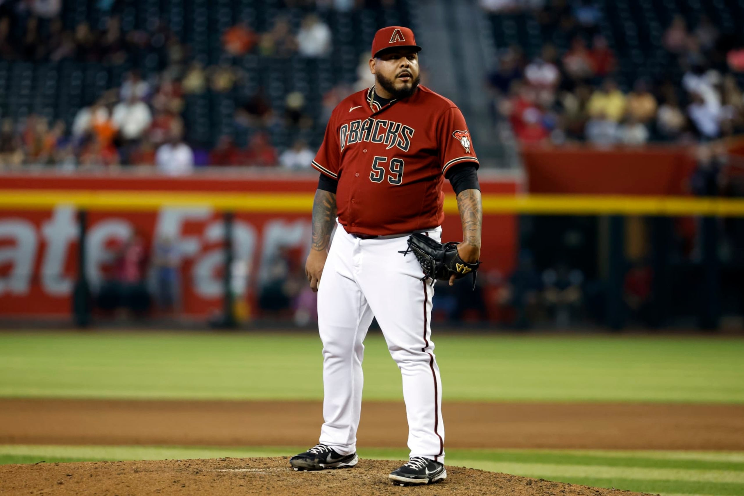 PHOENIX, ARIZONA - SEPTEMBER 25: Reyes Moronta #59 of the Arizona Diamondbacks pitches during the game against the San Francisco Giants at Chase Field on September 25, 2022 in Phoenix, Arizona. The Giants beat the Diamondbacks 3-2. (Photo by Chris Coduto/Getty Images)