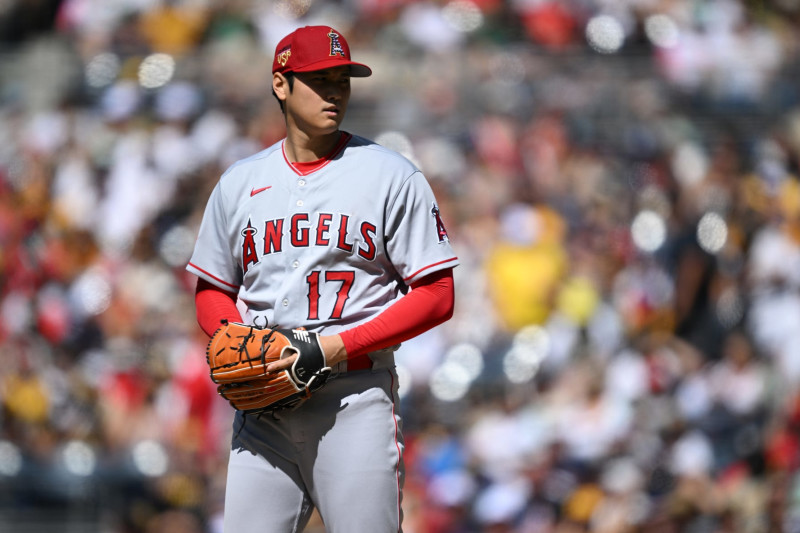 SAN DIEGO, CALIFORNIA - JULY 04: Shohei Ohtani #17 of the Los Angeles Angels throws a pitch against the San Diego Padres during the first inning at PETCO Park on July 04, 2023 in San Diego, California. (Photo by Orlando Ramirez/Getty Images)
