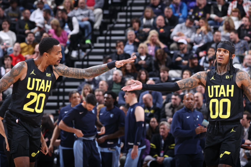 SALT LAKE CITY, UT - NOVEMBER 1: John Collins #20 of the Utah Jazz and Jordan Clarkson #00 of the Utah Jazz high five during the game against the Memphis Grizzlies on November 1, 2023 at vivint.SmartHome Arena in Salt Lake City, Utah. NOTE TO USER: User expressly acknowledges and agrees that, by downloading and or using this Photograph, User is consenting to the terms and conditions of the Getty Images License Agreement. Mandatory Copyright Notice: Copyright 2023 NBAE (Photo by Melissa Majchrzak/NBAE via Getty Images)