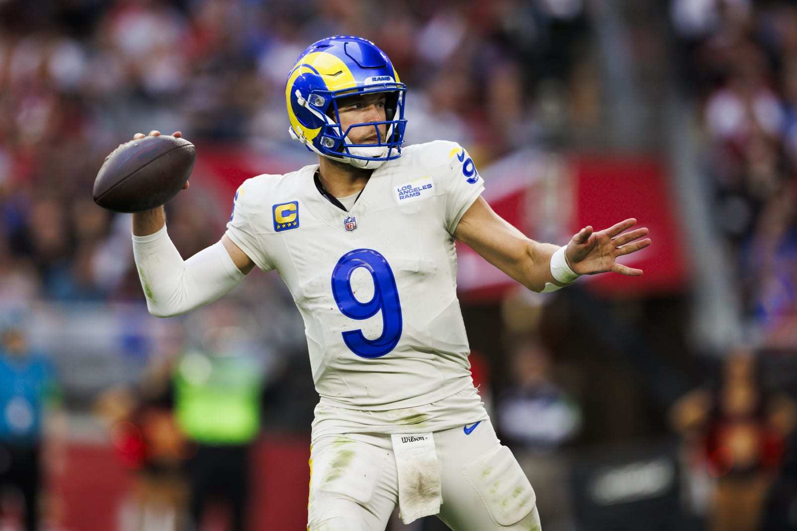 GLENDALE, ARIZONA - NOVEMBER 26: Matthew Stafford #9 of the Los Angeles Rams throws during a game against the Arizona Cardinals at State Farm Stadium on November 26, 2023 in Glendale, Arizona. (Photo by Ric Tapia/Getty Images)