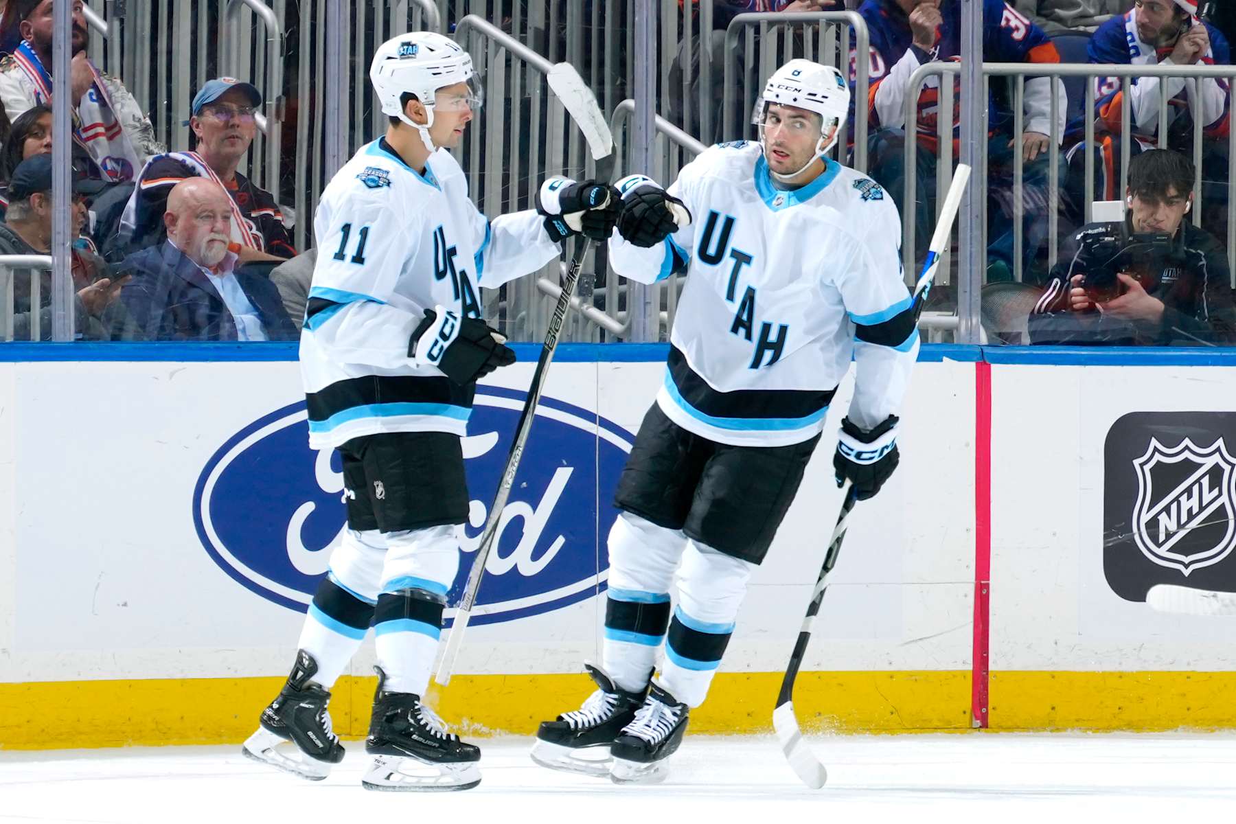 Dylan Guenther and Nick Schmaltz.