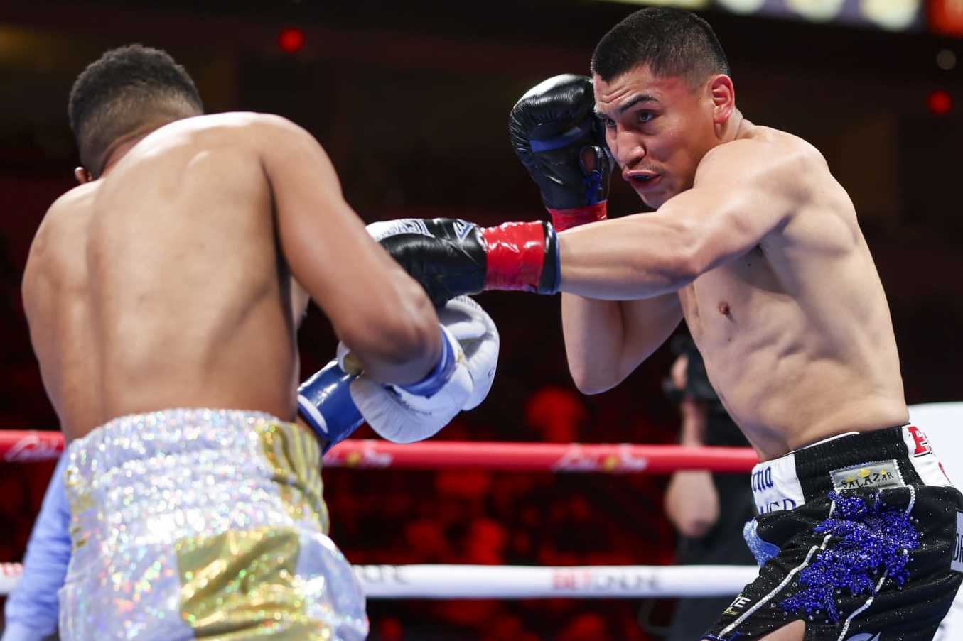 FRESNO, CALIFORNIA - APRIL 27: Vergil Ortiz Jr. lands a punch on Thomas Dulorme during a fight at Save Mart Center on April 27, 2024 in Fresno, California. (Photo by Cris Esqueda/Golden Boy/Getty Images)