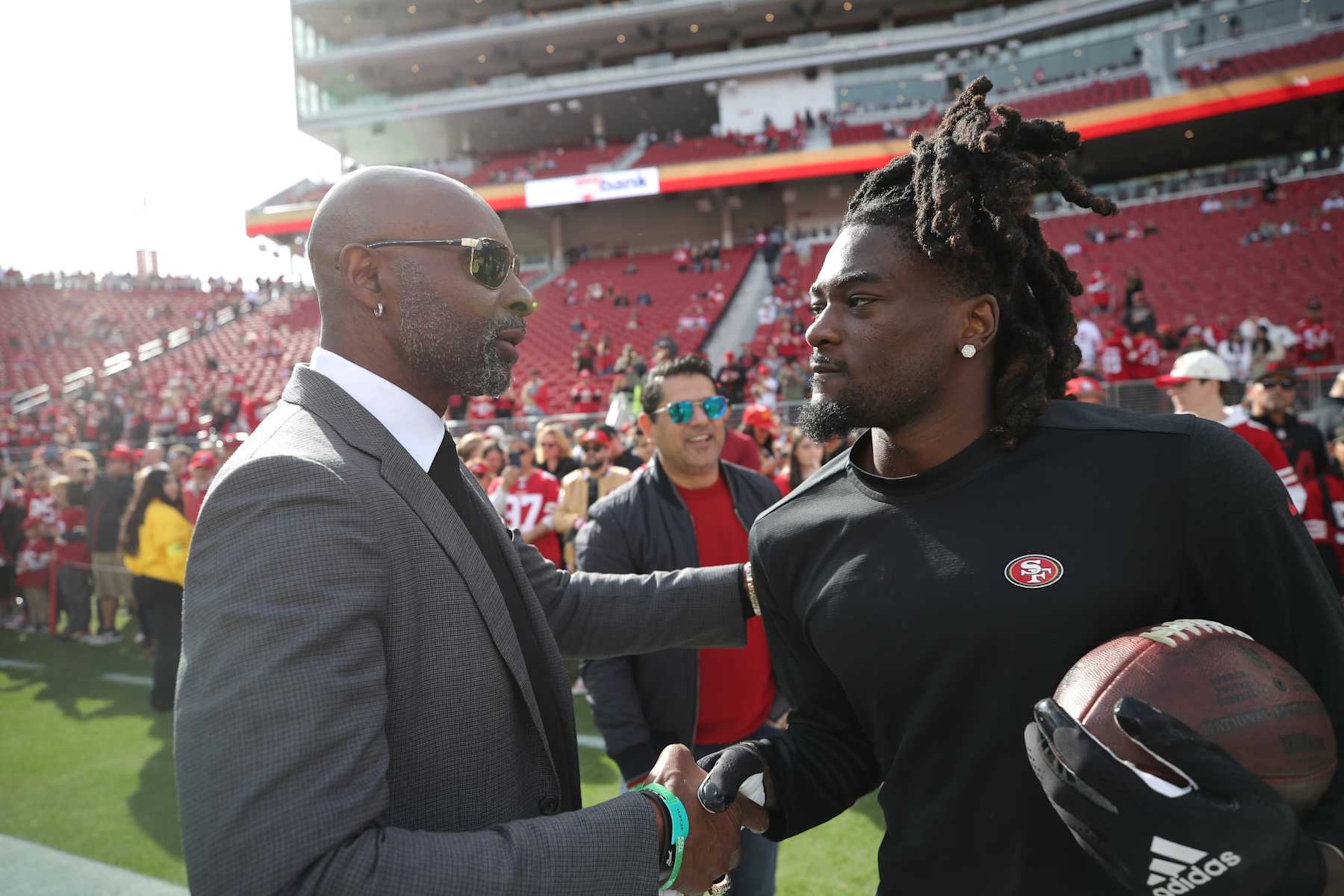 SANTA CLARA, CA - NOVEMBER 27: Brandon Aiyuk #11 of the San Francisco 49ers and Jerry Rice on the field before the game against the New Orleans Saints at Levi's Stadium on November 27, 2022 in Santa Clara, California. The 49ers defeated the Saints 13-0. (Photo by Michael Zagaris/San Francisco 49ers/Getty Images)