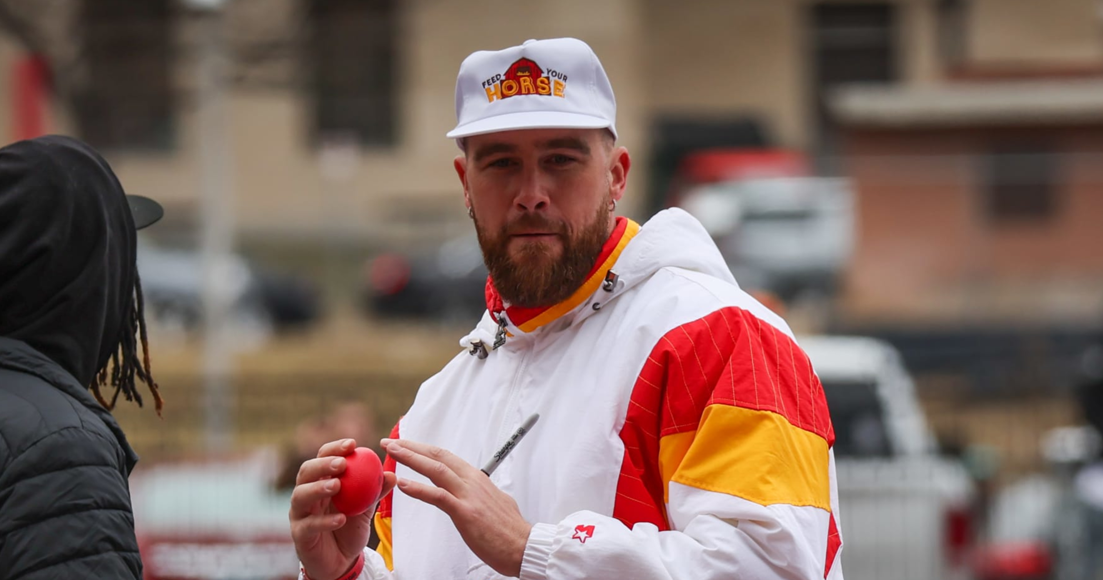 Travis Kelce's 1st pitch with Guardians goes awry, to delight of