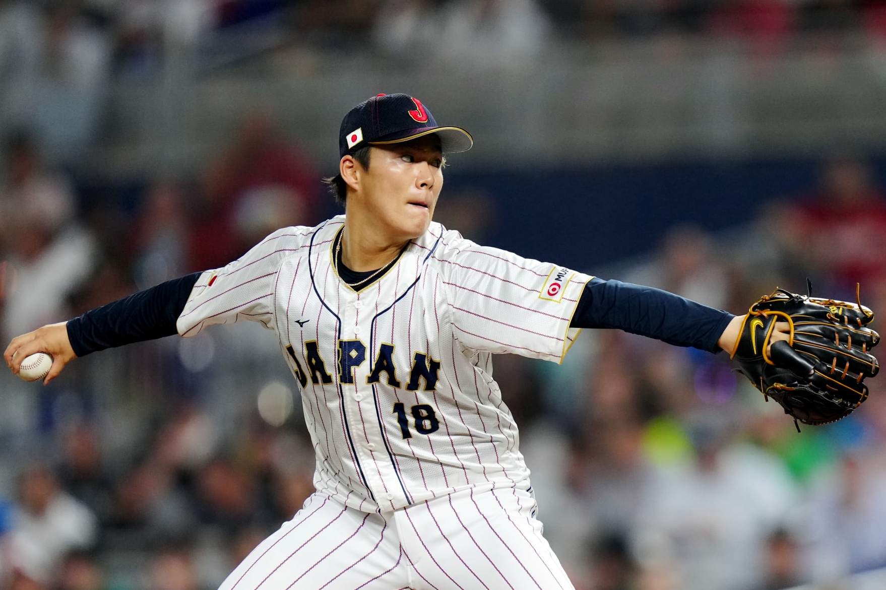 MIAMI, FL - MARCH 20:  Yoshinobu Yamamoto #18 of Team Japan pitches during the 2023 World Baseball Classic Semifinal game between Team Mexico and Team Japan at loanDepot Park on Monday, March 20, 2023 in Miami, Florida. (Photo by Daniel Shirey/WBCI/MLB Photos via Getty Images)