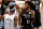 NEW YORK, NEW YORK - APRIL 10: Dennis Schroder #17 of the Los Angeles Lakers and Kyrie Irving #11 of the Brooklyn Nets have words after Irving was called for a foul against Schroder in the third quarter at Barclays Center on April 10, 2021 in the Brooklyn borough of New York City.Both Irving and Schroder were issued double technical fouls and ejected from the game.NOTE TO USER: User expressly acknowledges and agrees that, by downloading and or using this photograph, User is consenting to the terms and conditions of the Getty Images License Agreement. (Photo by Elsa/Getty Images)