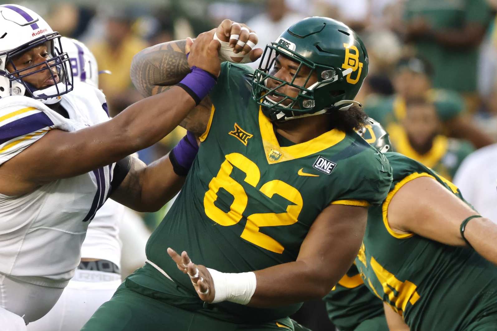WACO, TX -SEPTEMBER 3: Siaki Ika #62 of the Baylor Bears plays against the Albany Great Danes at McLane Stadium on September 3, 2022 in Waco, Texas. (Photo by Ron Jenkins/Getty Images)
