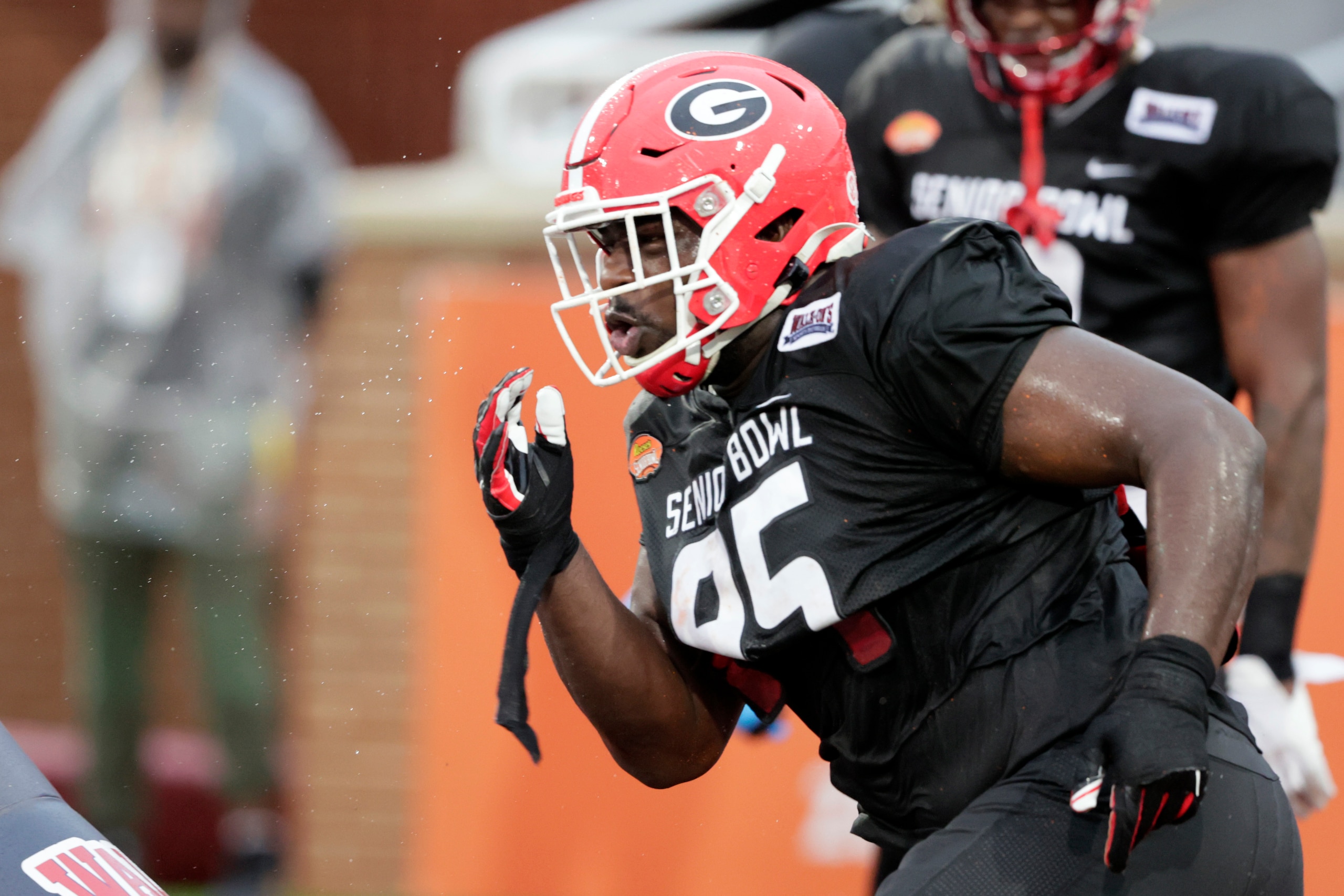 American Team defensive lineman Devonte Wyatt of Georgia runs through drills during practice for the Senior Bowl NCAA college football game Wednesday, Feb. 2, 2022, in Mobile, Ala. (AP Photo/Butch Dill) American Team defensive lineman Devonte Wyatt of Georgia runs through drills during practice for the Senior Bowl NCAA college football game Wednesday, Feb. 2, 2022, in Mobile, Ala. (AP Photo/Butch Dill)
