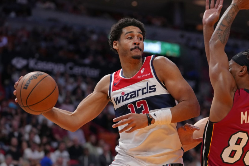 MIAMI, FL - MARCH 10: Jordan Poole #13 of the Washington Wizards passes the ball during the game against the Miami Heat on March 10, 2024 at Kaseya Center in Miami, Florida. NOTE TO USER: User expressly acknowledges and agrees that, by downloading and or using this Photograph, user is consenting to the terms and conditions of the Getty Images License Agreement. Mandatory Copyright Notice: Copyright 2024 NBAE (Photo by Eric Espada/NBAE via Getty Images)