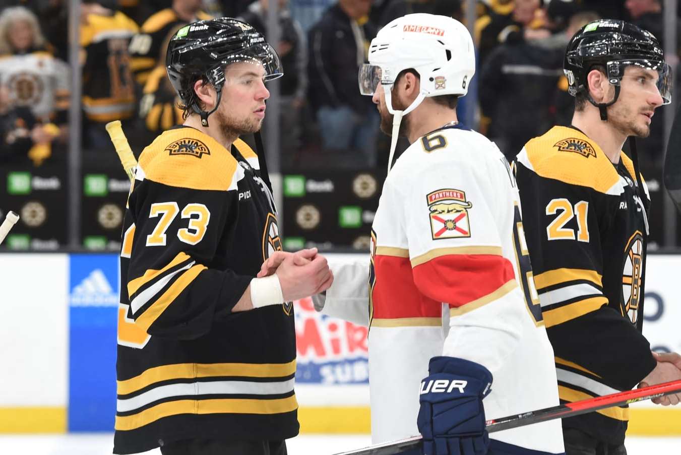 BOSTON, MASSACHUSETTS - APRIL 30: Charlie McAvoy #73 of the Boston Bruins shakes hands with Colin White #6 of the Florida Panthers after Game Seven of the First Round of the 2023 Stanley Cup Playoffs at TD Garden on April 30, 2023, in Boston, Massachusetts. (Photo by Steve Babineau/NHLI via Getty Images)