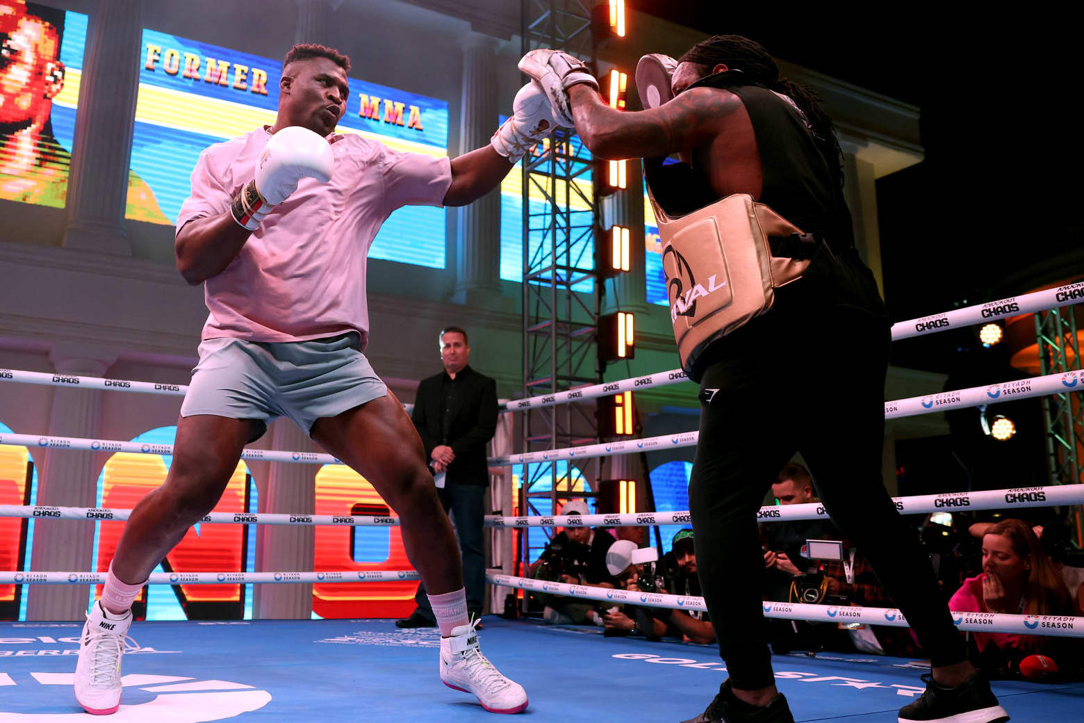 RIYADH, SAUDI ARABIA - MARCH 05: Francis Ngannou (L) trains with his trainer Dewey Cooper during a media workout ahead of the Heavyweight fight between Anthony Joshua and Francis Ngannou on the Knockout Chaos event between Anthony Joshua and Francis Ngannou, on March 05, 2024 in Riyadh, Saudi Arabia. (Photo by Richard Pelham/Getty Images)