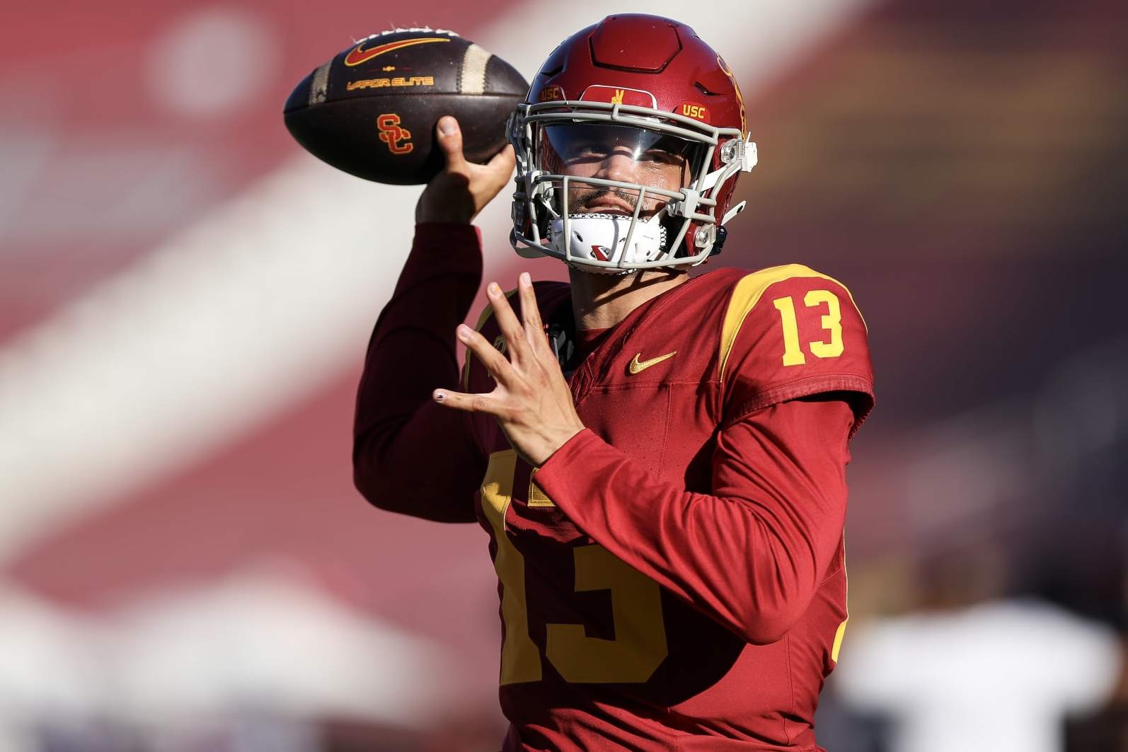 LOS ANGELES, CALIFORNIA - OCTOBER 21: Caleb Williams #13 of the USC Trojans warms up before the game against the Utah Utes at United Airlines Field at the Los Angeles Memorial Coliseum on October 21, 2023 in Los Angeles, California. (Photo by Meg Oliphant/Getty Images)