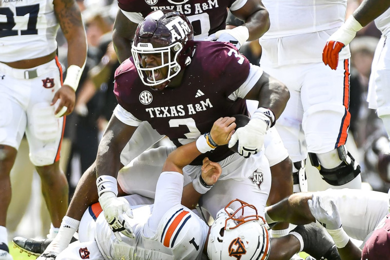 COLLEGE STATION, TEXAS - SEPTEMBER 23: Defensive lineman McKinnley Jackson #3 of the Texas A&M Aggies celebrates after sacking quarterback Payton Thorne #1 of the Auburn Tigers at Kyle Field on September 23, 2023 in College Station, Texas. (Photo by Logan Riely/Getty Images)