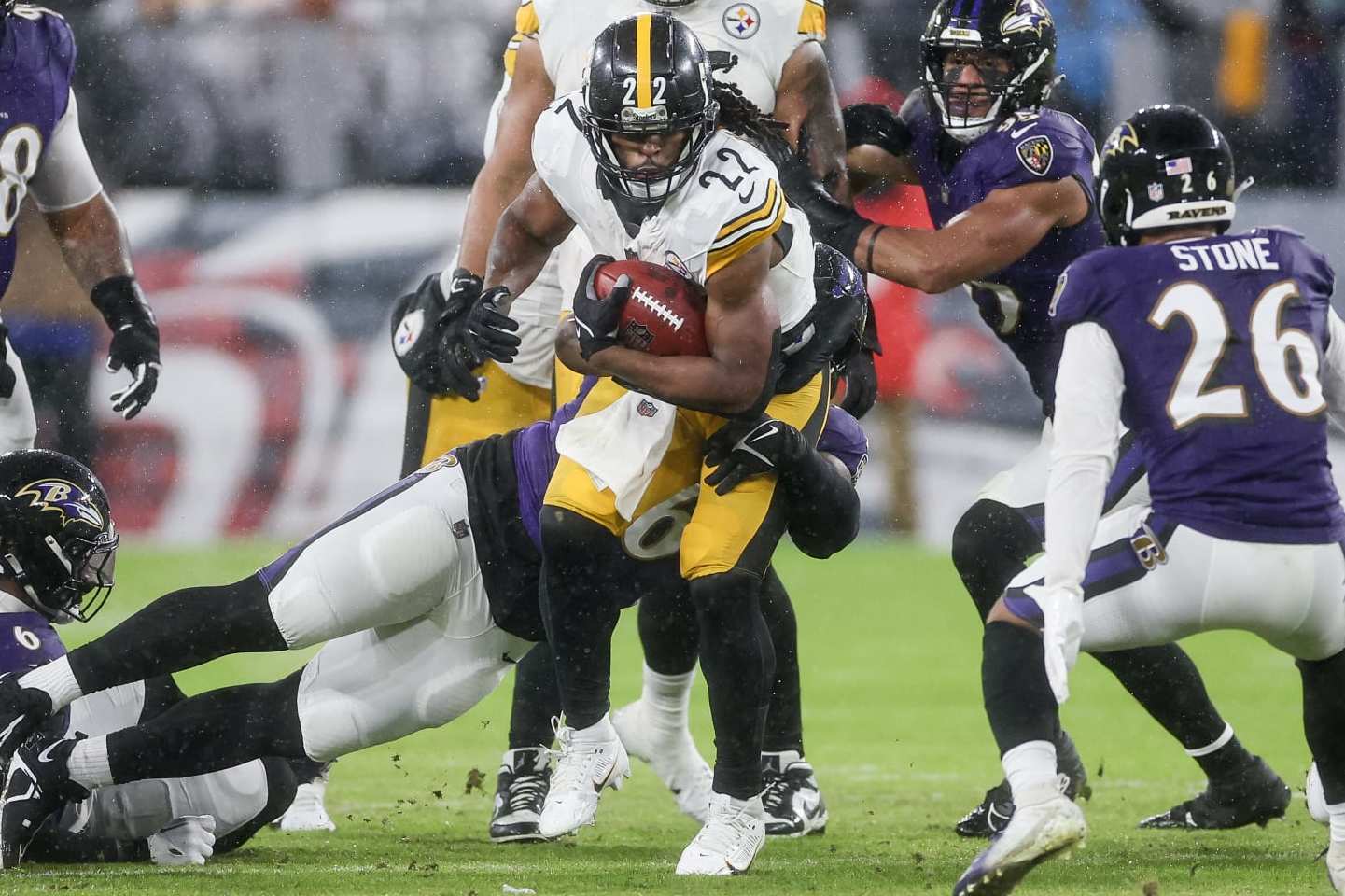 BALTIMORE, MARYLAND - JANUARY 06: Najee Harris #22 of the Pittsburgh Steelers runs the ball up the field in the first quarter of a game against the Baltimore Ravens at M&T Bank Stadium on January 06, 2024 in Baltimore, Maryland. (Photo by Rob Carr/Getty Images)