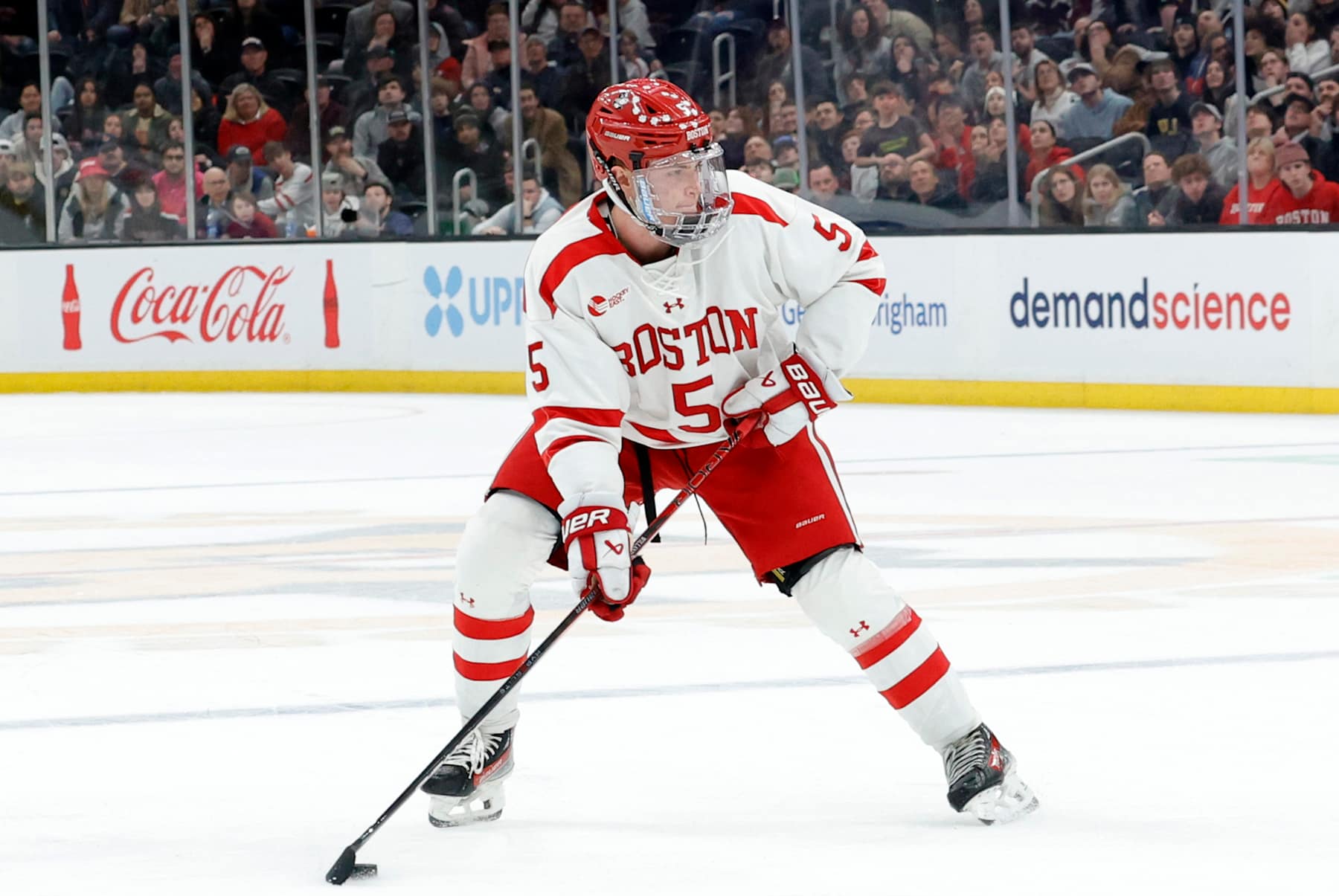 BOSTON, MA - FEBRUARY 12: Boston University defenseman Tom Willander (5) holds the puck during the Beanpot Championship game between Boston University and Northeastern on February 12, 2024, at TD Garden in Boston, Massachusetts. (Photo by Fred Kfoury III/Icon Sportswire via Getty Images)