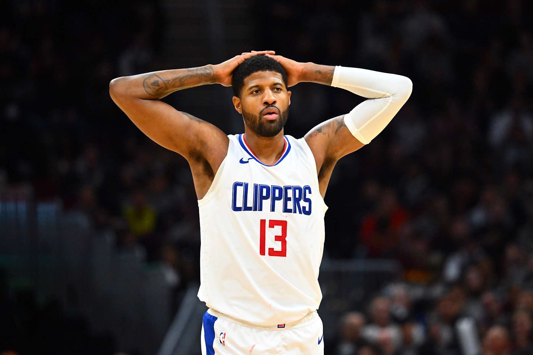 CLEVELAND, OHIO - JANUARY 29: Paul George #13 of the LA Clippers reacts after being called for his sixth foul during the fourth quarter against the Cleveland Cavaliers at Rocket Mortgage Fieldhouse on January 29, 2024 in Cleveland, Ohio. The Cavaliers defeated the Clippers 118-108. NOTE TO USER: User expressly acknowledges and agrees that, by downloading and or using this photograph, User is consenting to the terms and conditions of the Getty Images License Agreement. (Photo by Jason Miller/Getty Images)
