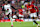 MANCHESTER, ENGLAND - FEBRUARY 24: Calvin Bassey and Marcus Rashford of Manchester United run for the ball during the Premier League match between Manchester United and Fulham FC at Old Trafford on February 24, 2024 in Manchester, England. (Photo by Clive Brunskill/Getty Images)