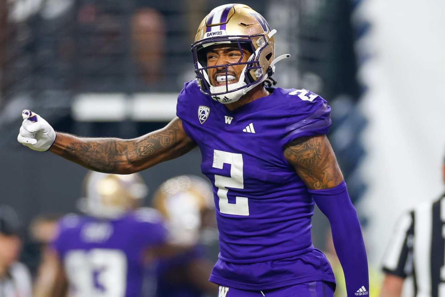 LAS VEGAS, NEVADA - DECEMBER 1: Ja'Lynn Polk #2 of the Washington Huskies reacts during the Pac-12 Championship game against the Oregon Ducks at Allegiant Stadium on December 1, 2023 in Las Vegas, Nevada. (Photo by Brandon Sloter/Image Of Sport/Getty Images)