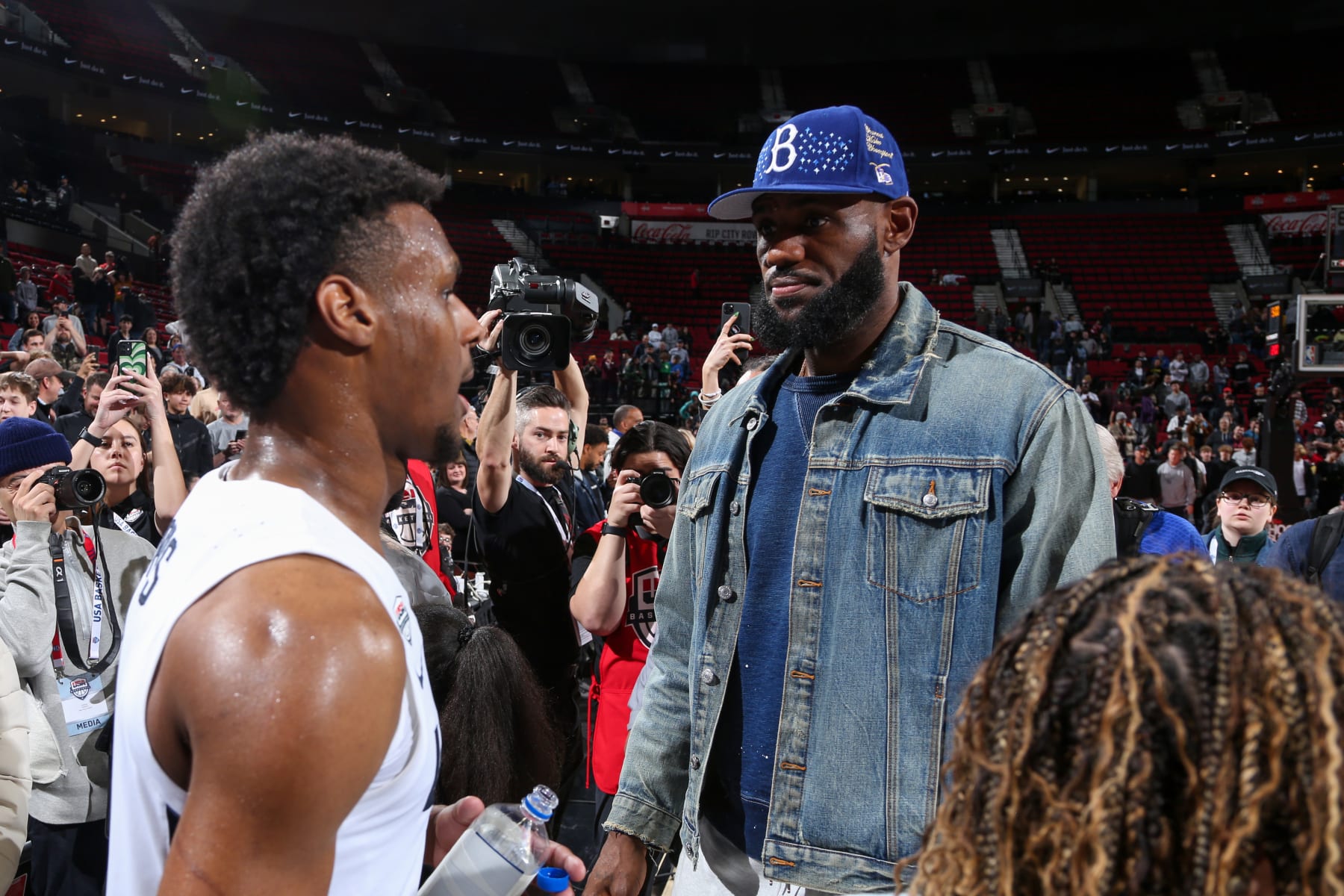 PORTLAND, OR - APRIL 8: LeBron James talks with Bronny James # 6 of Team USA throughout the 2023 Nike Hoop Summit on April 8, 2023 at the Moda Center Arena in Portland, Oregon. KEEP IN MIND TO USER: User specifically acknowledges and concurs that, by downloading and or utilizing this picture, user is granting the conditions of the Getty Images License Agreement. Necessary Copyright Notice: Copyright 2023 NBAE (Photo by Sam Forencich/NBAE through Getty Images)