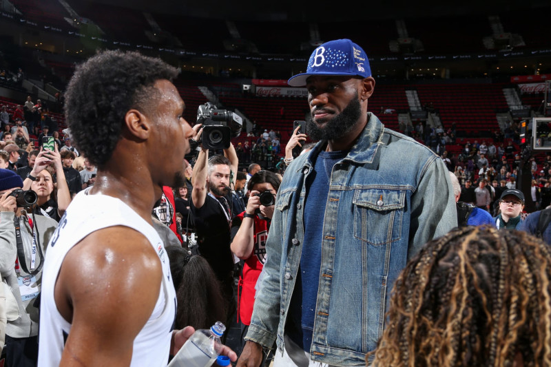 PORTLAND, OR - APRIL 8: LeBron James talks with Bronny James #6 of Team USA during the 2023 Nike Hoop Summit on April 8, 2023 at the Moda Center Arena in Portland, Oregon. NOTE TO USER: User expressly acknowledges and agrees that, by downloading and or using this photograph, user is consenting to the terms and conditions of the Getty Images License Agreement. Mandatory Copyright Notice: Copyright 2023 NBAE (Photo by Sam Forencich/NBAE via Getty Images)
