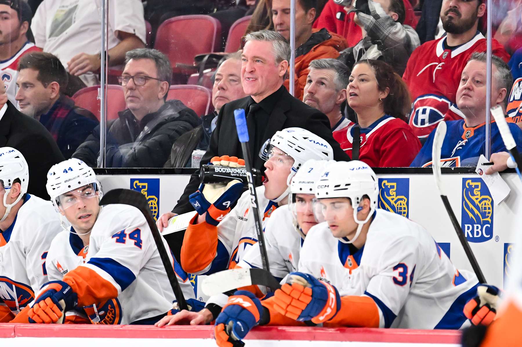 MONTREAL, CANADA - DECEMBER 03:  Head coach Patrick Roy of the New York Islanders handles bench duties during the second period against the Montreal Canadiens at the Bell Centre on December 3, 2024 in Montreal, Quebec, Canada.  The Montreal Canadiens defeated the New York Islanders 2-1 in overtime.  (Photo by Minas Panagiotakis/Getty Images)