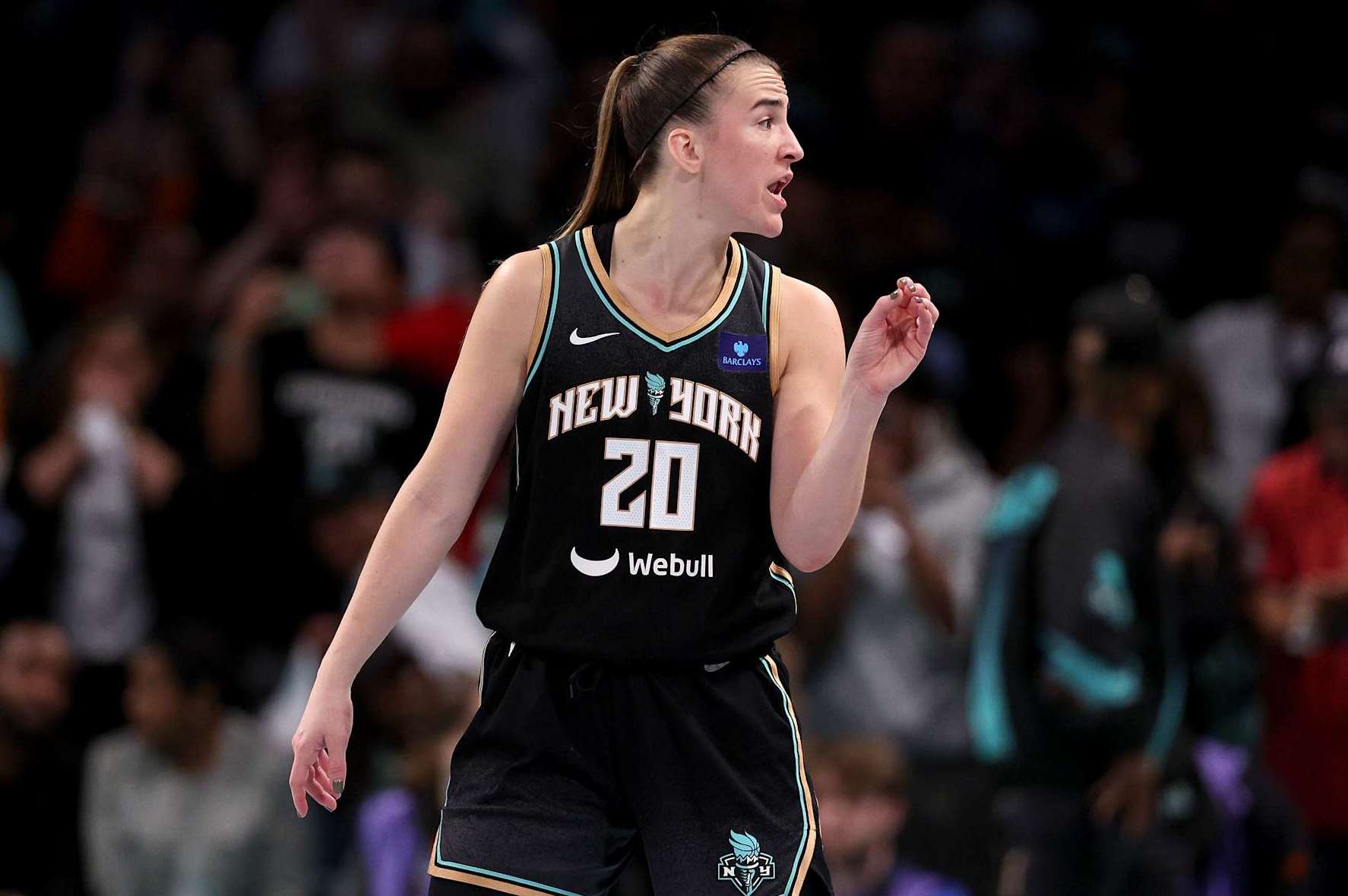 NEW YORK, NEW YORK - OCTOBER 20: Sabrina Ionescu #20 of the New York Liberty reacts in the fourth quarter against the Minnesota Lynx during Game Five of the WNBA Finals at Barclays Center on October 20, 2024 in the Brooklyn borough of New York City. The New York Liberty defeated the Minnesota Lynx 67-62 in overtime to win the championship. NOTE TO USER: User expressly acknowledges and agrees that, by downloading and or using this photograph, User is consenting to the terms and conditions of the Getty Images License Agreement. (Photo by Elsa/Getty Images)